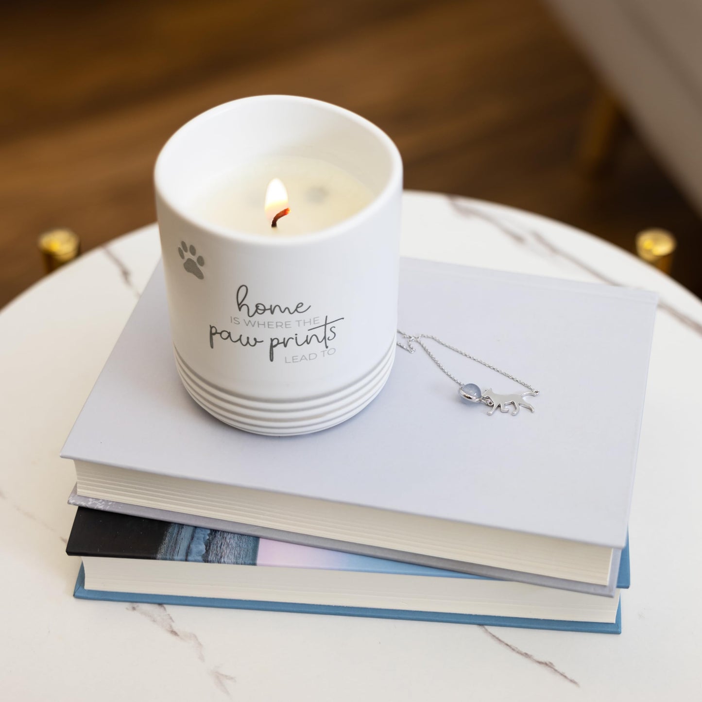 Pavilion Gift Company - Home is Where The Pawprints Lead to - 10 oz Wax Reveal Secret Surprise Message Single-Wick Jasmine Scented Candle Mom Dad Pet Parent Housewarming Animal Lover Adoption Gift