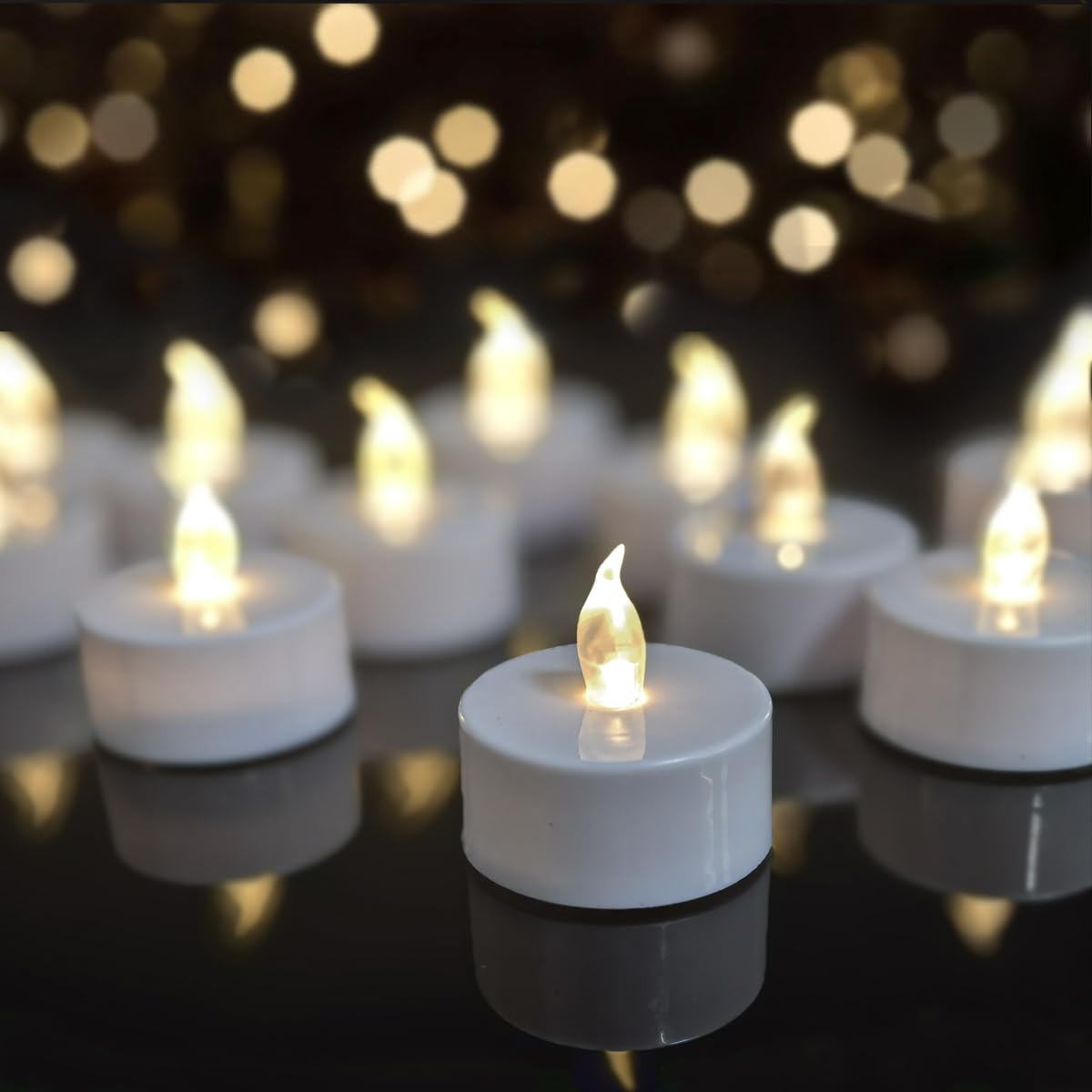 Battery tealights ,24 Pack Realistic and Bright Flickering Last 200 hours Longer Battery Operated Flameless LED Tea Lights candles for Holiday, Weddings, Birthdays,Halloween,Christmas(Warm White)