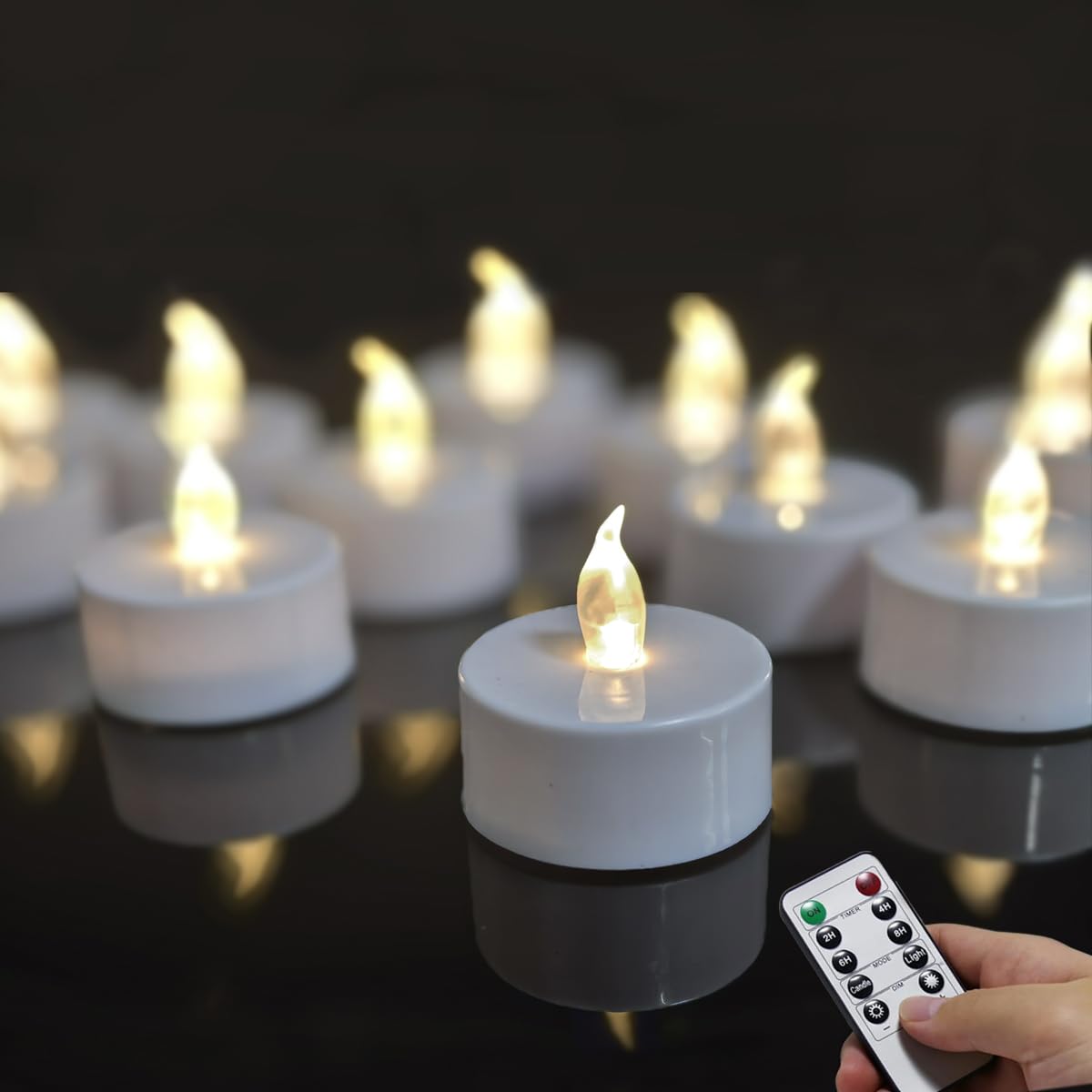 Remote Flameless led tea lights candles with timer,400+ Hours Battery Life,Realistic Flickering Flameless Votive Candles,Safe Decorative for Halloween Christmas/Wedding/Home Decor (Warm White 12 Pack)