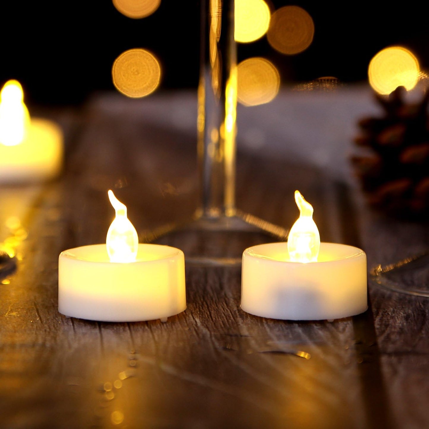 AGPTEK No Flicker Flameless LED Tealights Candles Battery-Operated Long Lasting Tealights for Wedding Holiday Party Home Decoration 24pcs (Warm White)