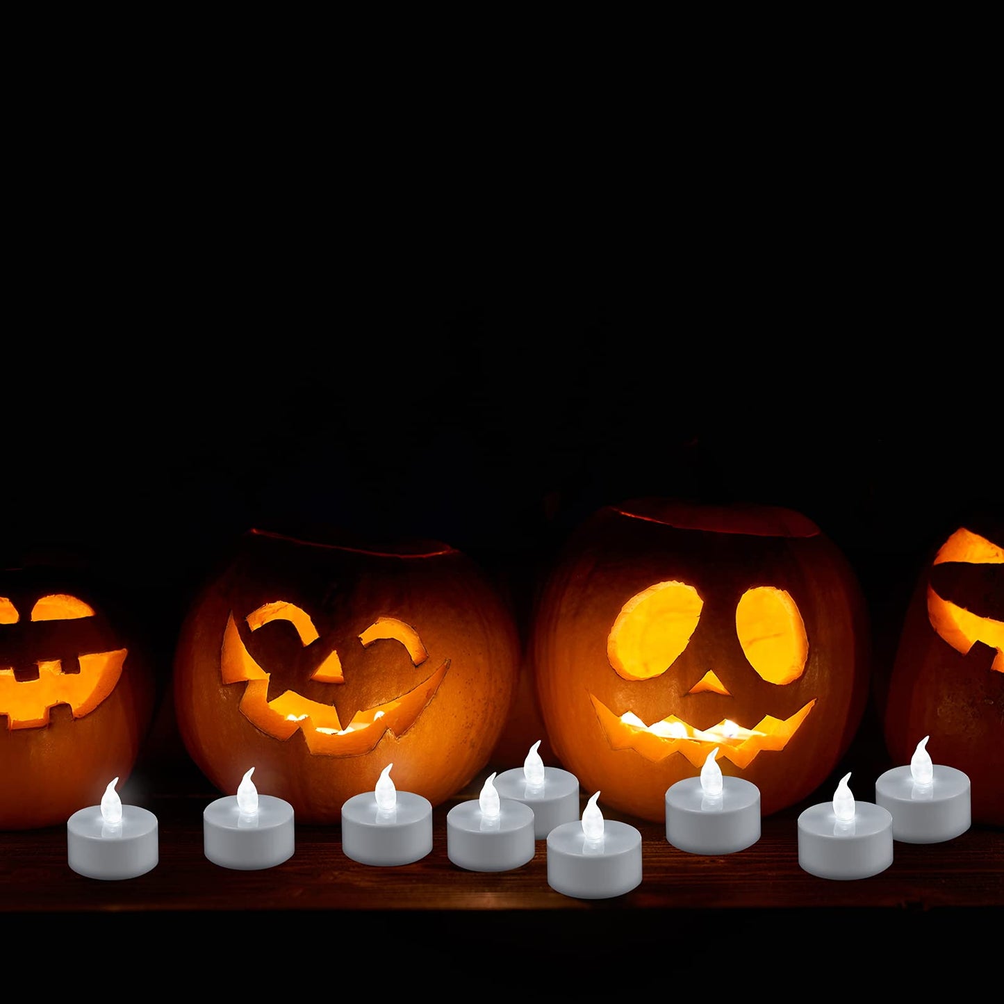 YIWER 100pcs Flameless Tea Lights Candles Realistic LED Flickering Operated Pumkin LED TeaLights Candles Long Lasting Electric Fake Candles Decoration for Party and Gifts Ideas