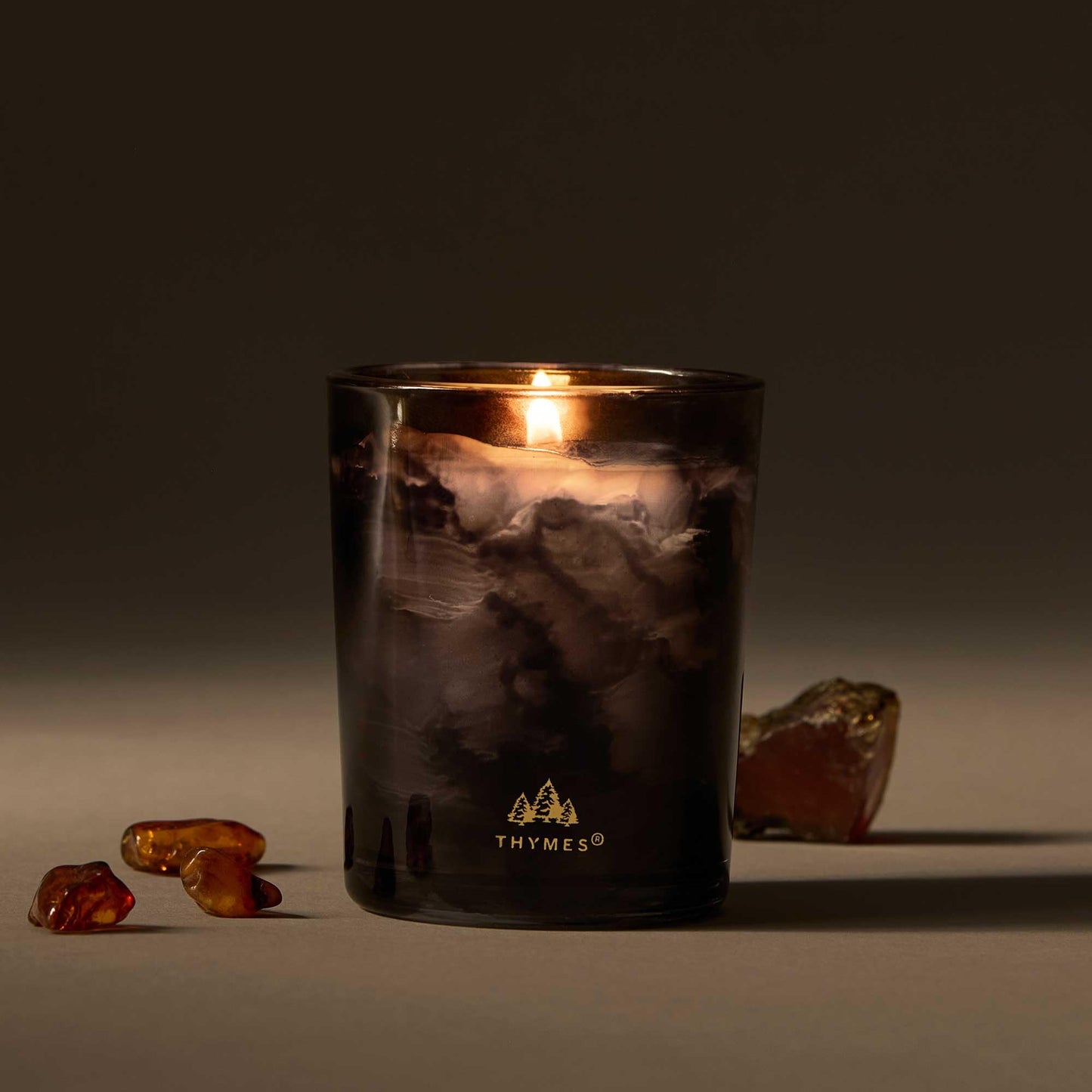Thymes Noir Woods Scented Candles for Home Decor – Notes of Fresh Evergreen, Smoky Wood & Golden Amber – Luxury Home Fragrance Gifts for Women & Men – Burns Up to 20 Hrs (Votive Candle, 2 oz)