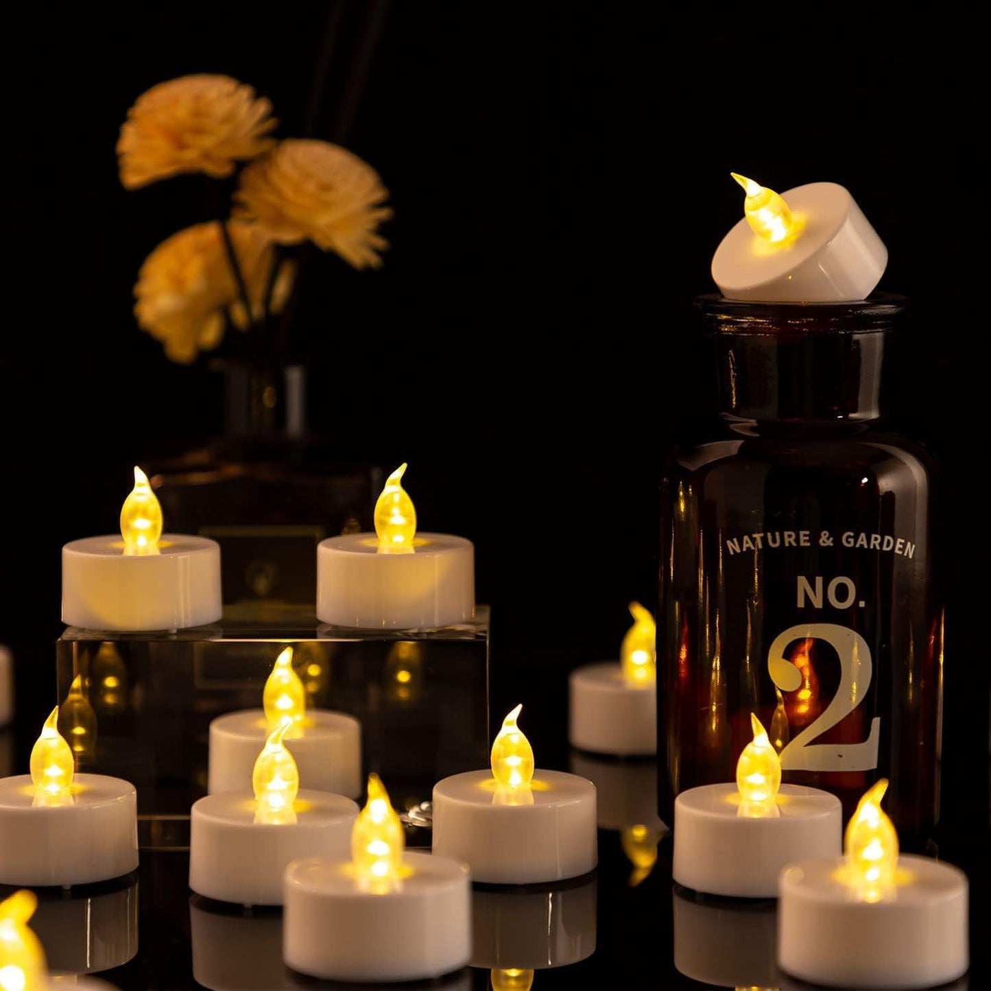 Tappovaly Battery Operated LED Tea Lights:24 Pack Flameless Votive Candles Lamp Realistic and Bright Flickering Long Lasting 200Hours for Wedding Holiday Party Home Decoration (Warm Yellow)