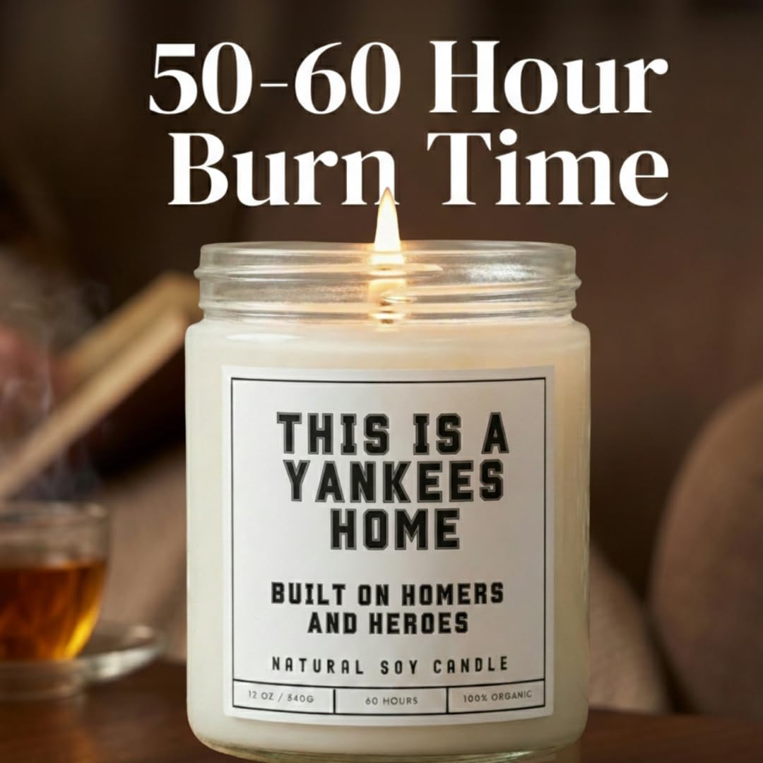 This is a Yankees Home - Built on Homers and Heroes Candle - Scented Soy Wax Candle (8.0 oz) 50-60 Hour Burn Time, Cotton Wick, Frosted White Glass Jar