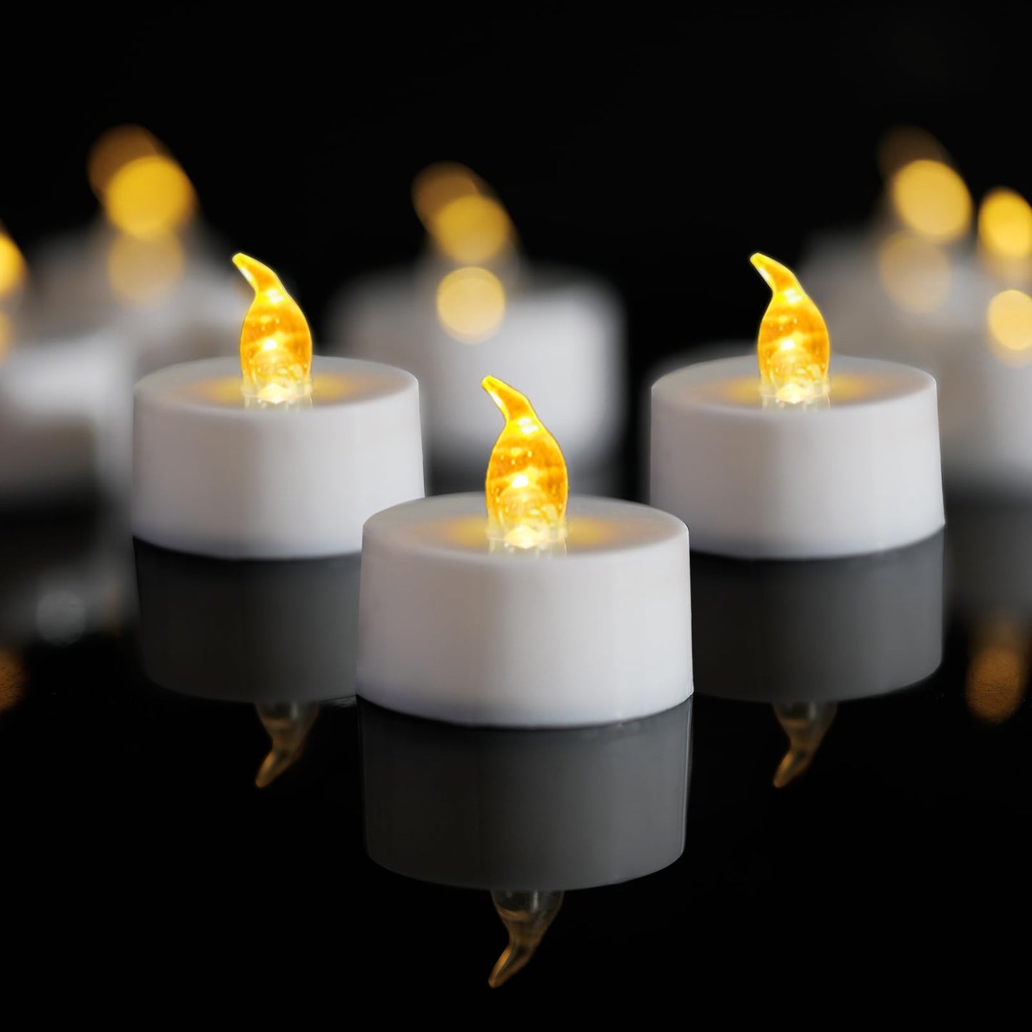 LANKER 24 Pack LED Tea Lights Candles, Flickering Warm Yellow Flameless Tealights, Long Lasting Battery Operated Fake Candles, Decoration for Halloween and Christmas (Yellow-24pcs)