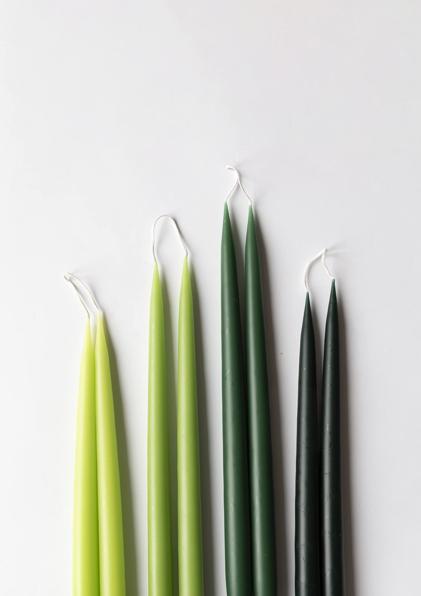 Kunstindustrien® Taper Candles – Set of 4, 13.8" – Made in Denmark, Long Burning Candles 15h, Unscented & Smokeless Candlesticks – Elegant Tall Candles for Weddings Dinners & Home Decor (Forest Green)