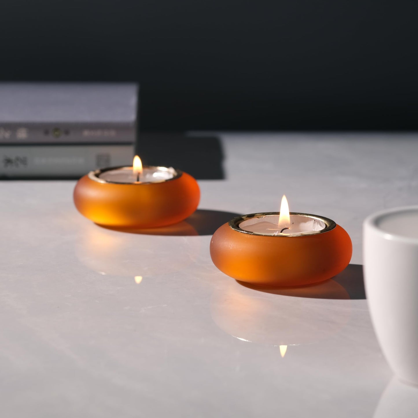 ICNBUYS Handmade Decorative Pebble Tealight Candle Holders Set of 2 - Handcrafted Home Decor Accent for Calming Earthy Aesthetic Orange Matte Finish Resin Diameter 2.6 inches