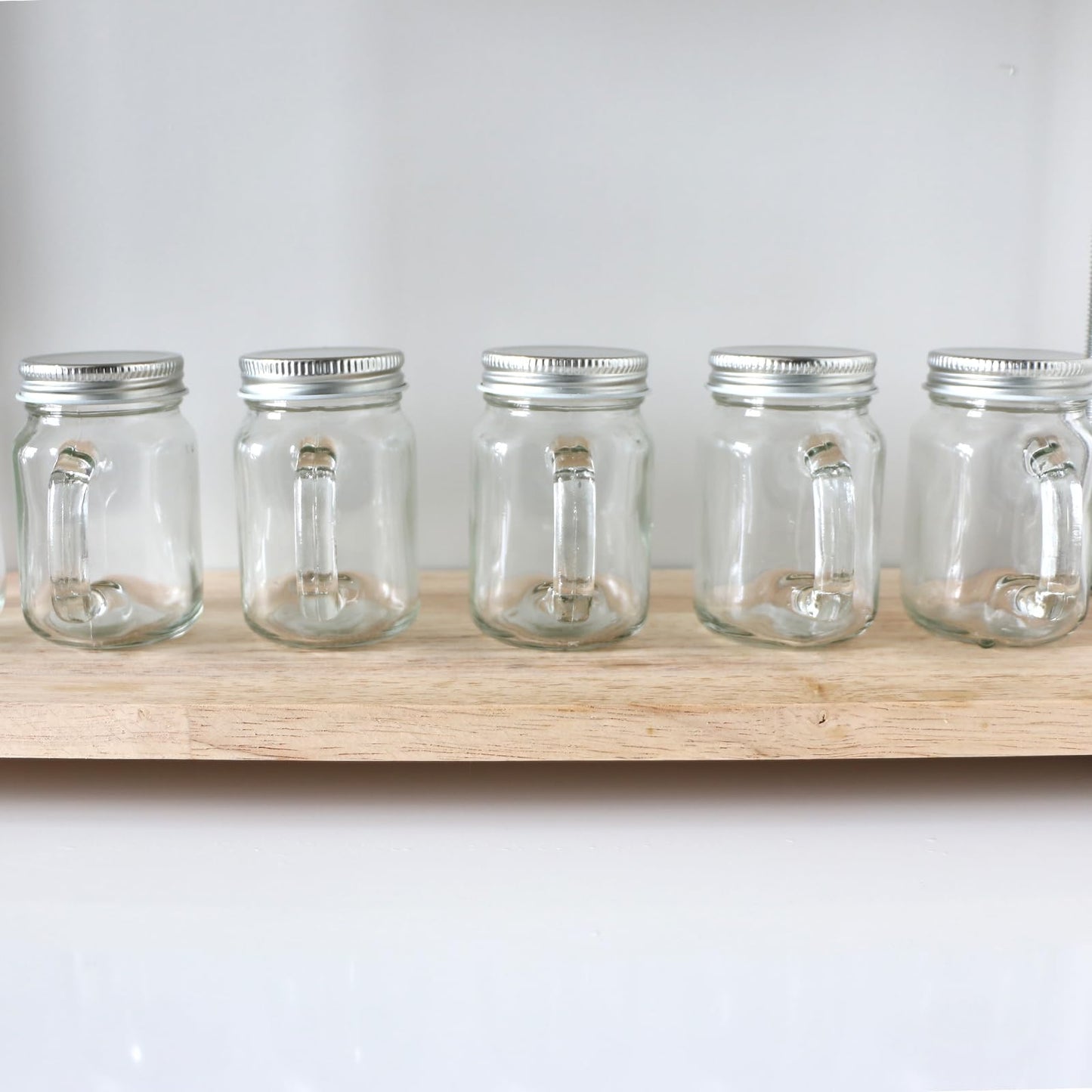 Homelike Style 4 oz Mini Mason Jar Mugs with Handle, Small Glass Jars with Airtight Metal Lids, 12 Pack Empty Glass Mugs for Gift Party Wedding Candle and Favor