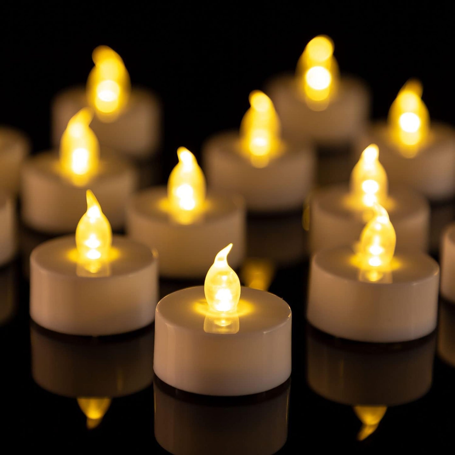 PUNPUBA LED Tea Lights Candles- 100Pack Flameless Candles Realistic and Bright Flickering Long Lasting 200Hours for Holiday Celebration,Party, Home Decoration WarmYellow,Battery Operated