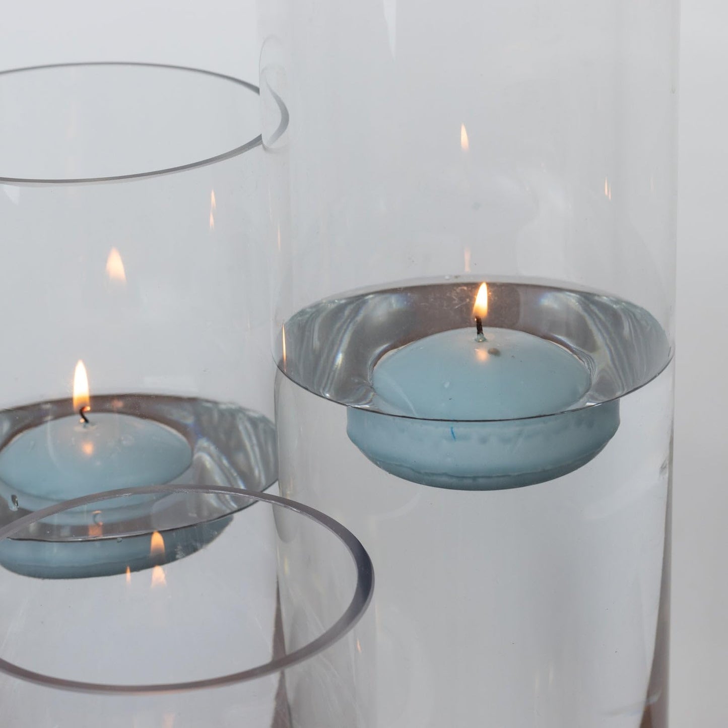 Efavormart 12 Pack 3" Dusty Blue Unscented Floating Candles, Long Burn Dripless Wax Discs with Cotton Wick for Cylinder Vases and Wedding Centerpieces