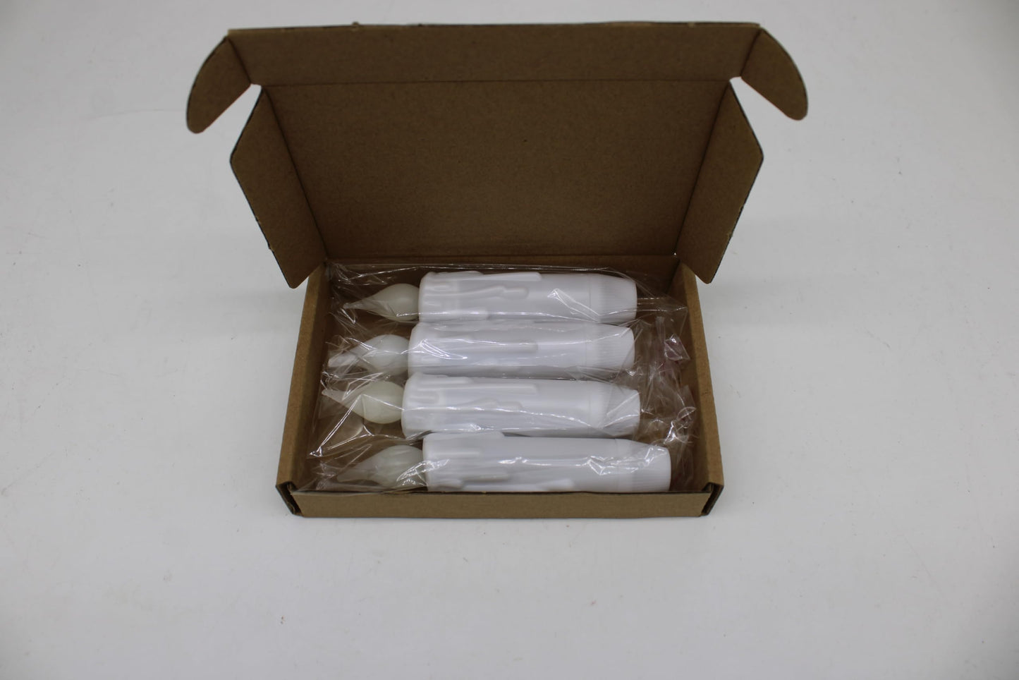 CVHOMEDECO. Flickering Taper Candles LED Drip Flameless Candles, Battery Operated with Timer, White, 4-3/4 Inch, Set of 4