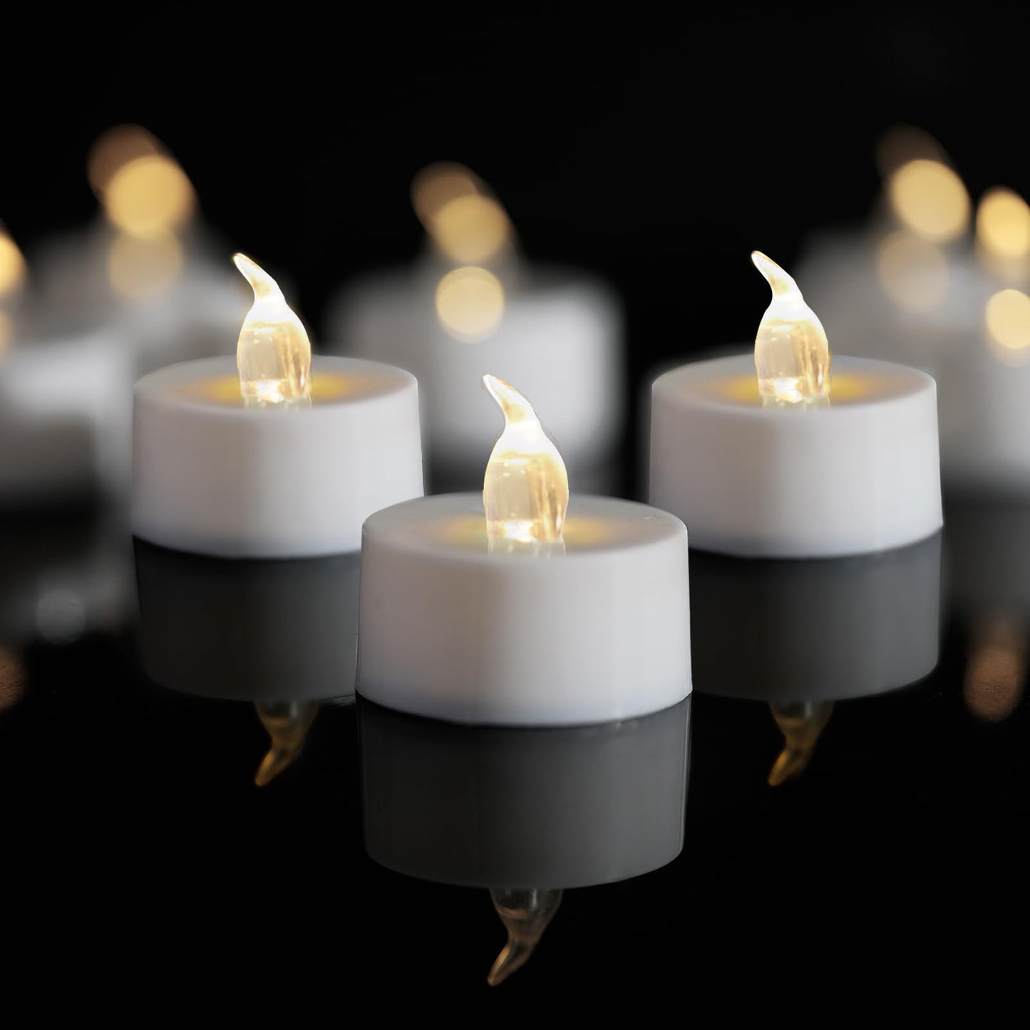 LANKER 24 Pack LED Tea Lights Candles, Warm White Flickering Flameless Tealights, Long Lasting Battery Operated Fake Candles, Decoration for Halloween (Warm White - 24pcs)