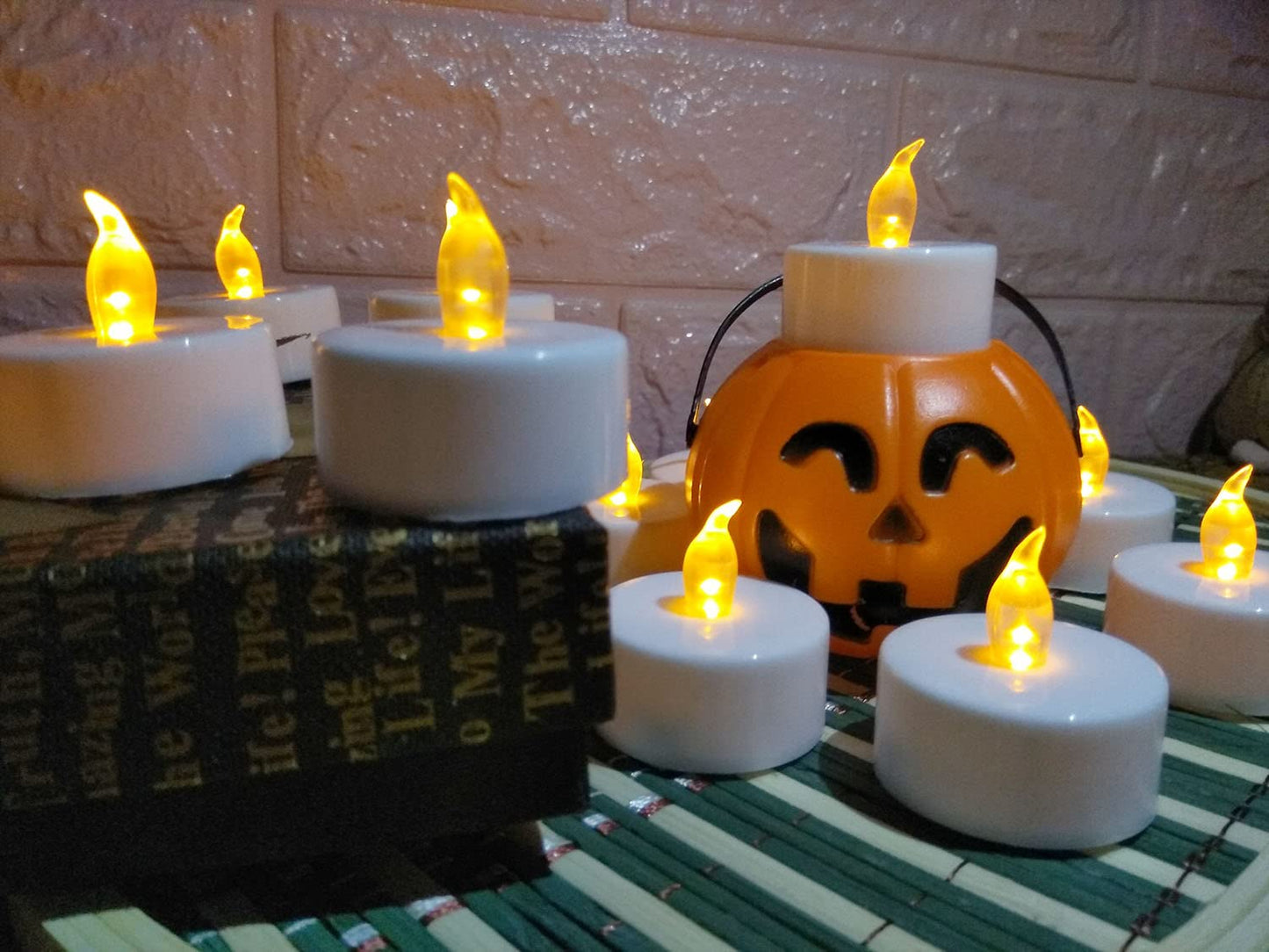 YIWER Tea Lights LED Tea Light Candles 200 Hours Pack of 100 Realistic Flickering Bulb Battery Operated Tea Lights for Seasonal Festival Celebration Electric Fake Candle in Warm Yellow(2 * 50)