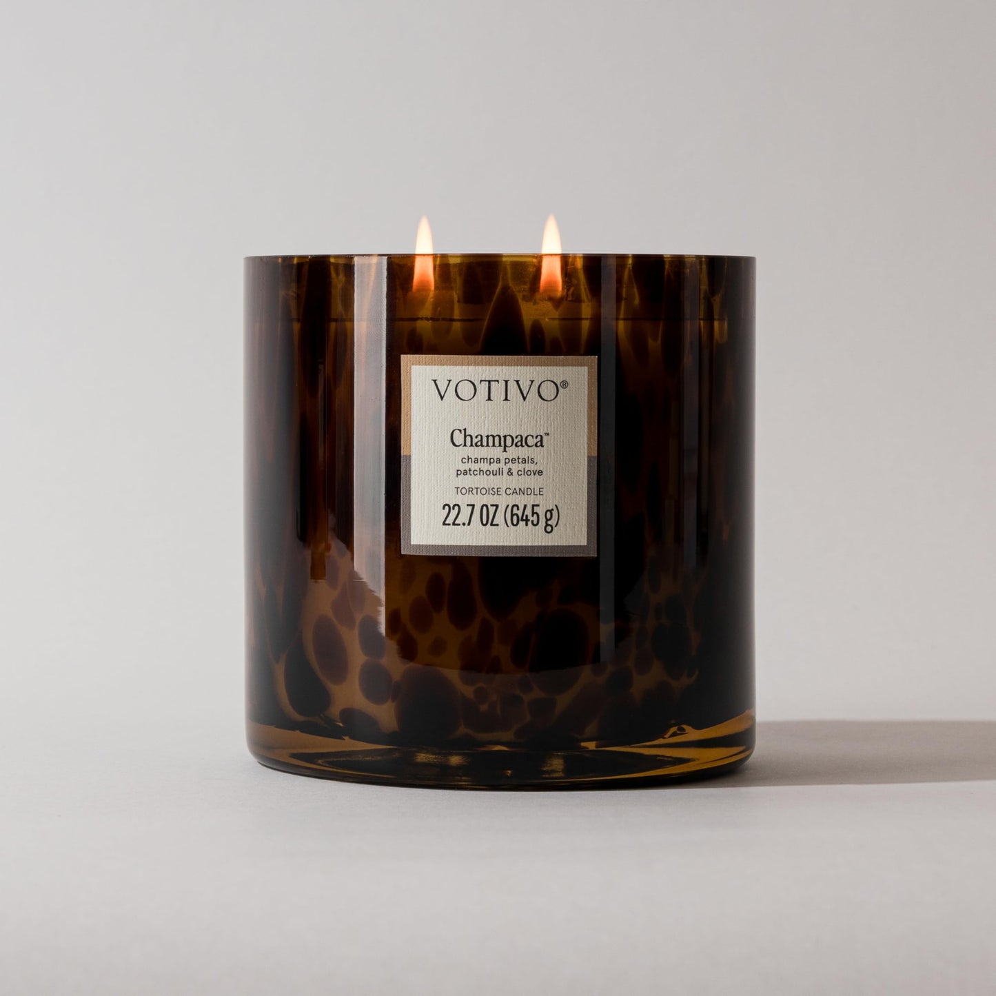 Votivo Champaca Tortoise Scented Candle | 22.7 oz Soy Wax Blend | Patchouli Scent | Decorative Home Decor Tortoiseshell Pattern | 100 Hour Burn Time