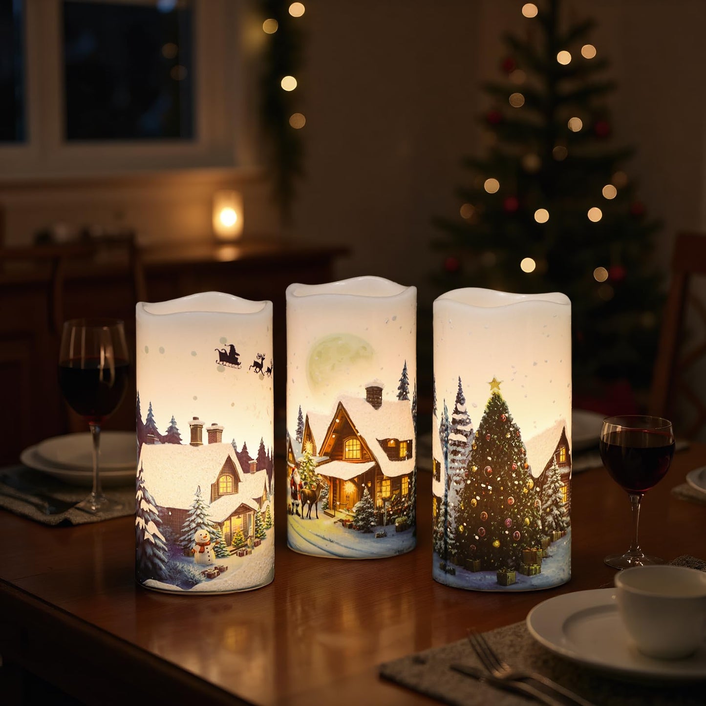 GenSwin Christmas Flameless Candles with Remote Timer, Set of 2 Christmas LED Battery Operated Pillar Candles with Snow House, Santa, Reindeer Decals for Holiday Winter Party Home Decor(D3” x H6”)