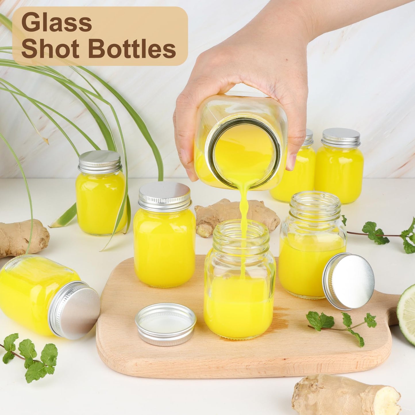 CARBLIN 25 Pack 2 oz Mason Jars with Silver Lids, Mini Glass Jar for Ginger Shots, Small Juice Shot Bottles with Caps, Container for Beverage Storage Candle Gifts Honey Jam Spices Party Favors