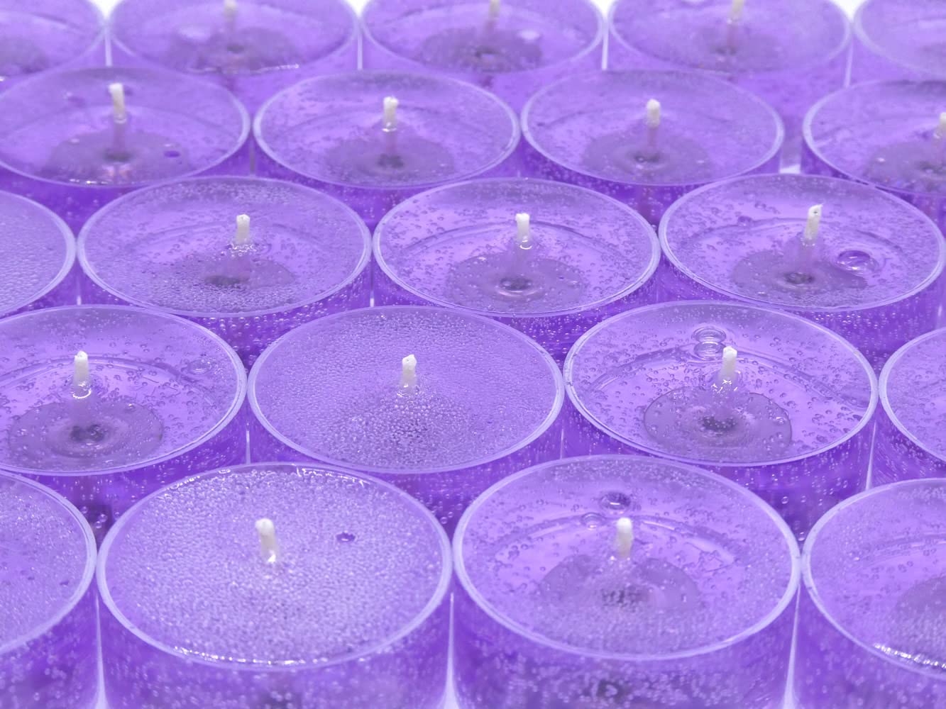 24 Pack Lavender Color Unscented Up to 8 Hour Mineral Oil Based Tea Light Candles for Home and Special Events by The Gel Candle Company™
