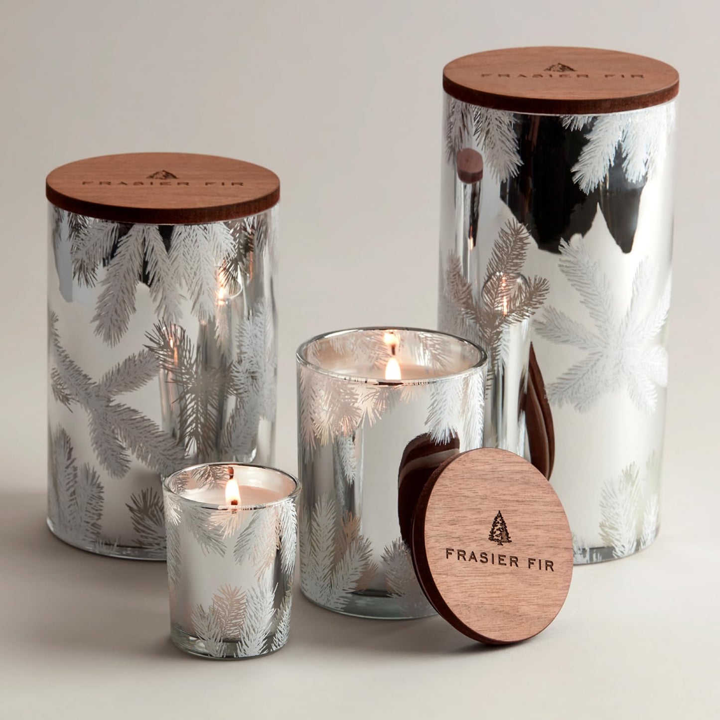 Thymes Frasier Fir Candle – Pine Needle Design – Holiday Scented Candle – Notes of Crisp Siberian Fir, Cedarwood & Sandalwood – Luxury Home Fragrance Gifts for Women & Men – Silver (Statement, 2 oz)