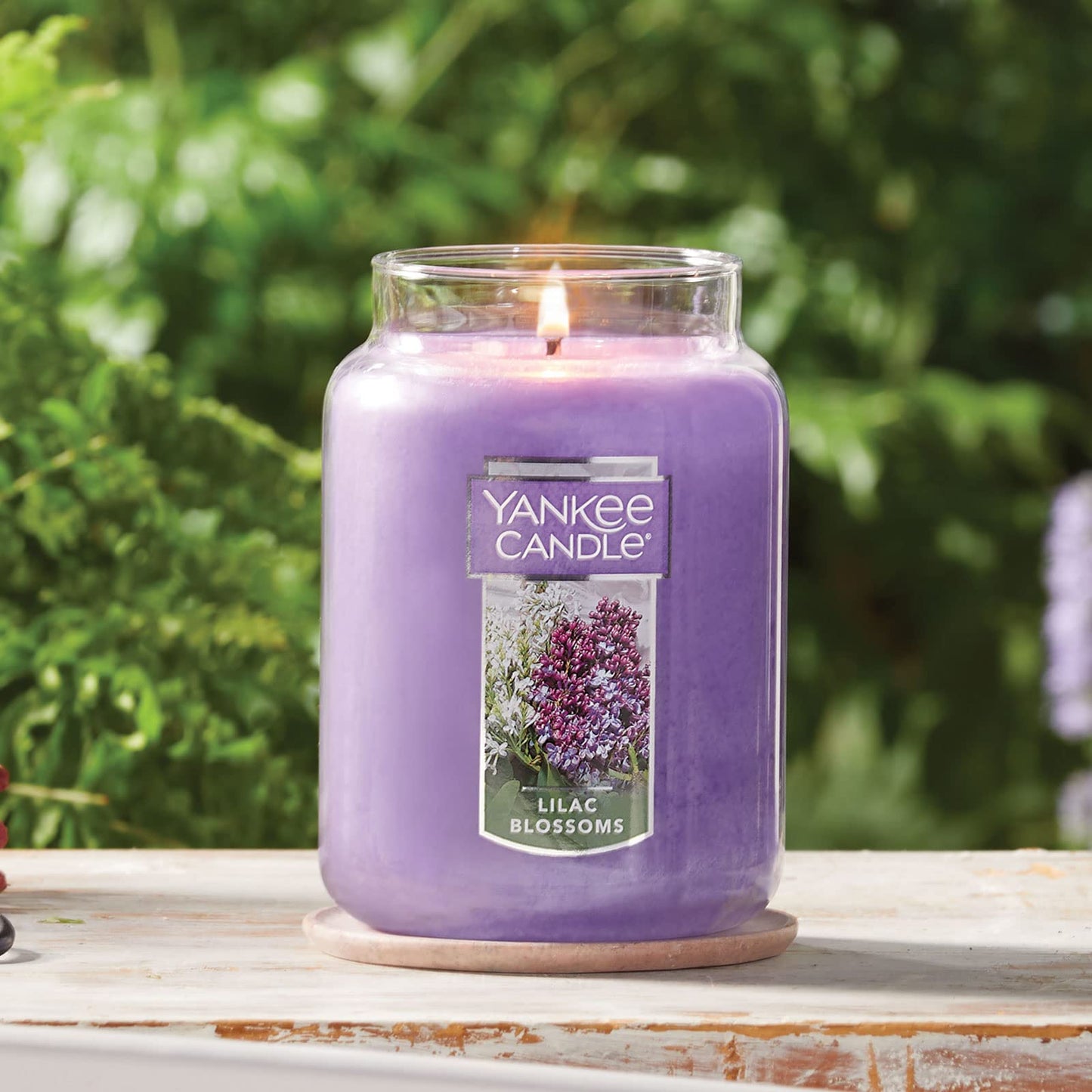 Yankee Candle Lilac Blossoms Scented Classic 22oz Large Jar Single Wick Candle Over 110 Hours of Burn Time Perfect for Gifting Gatherings and Seasonal Decorations
