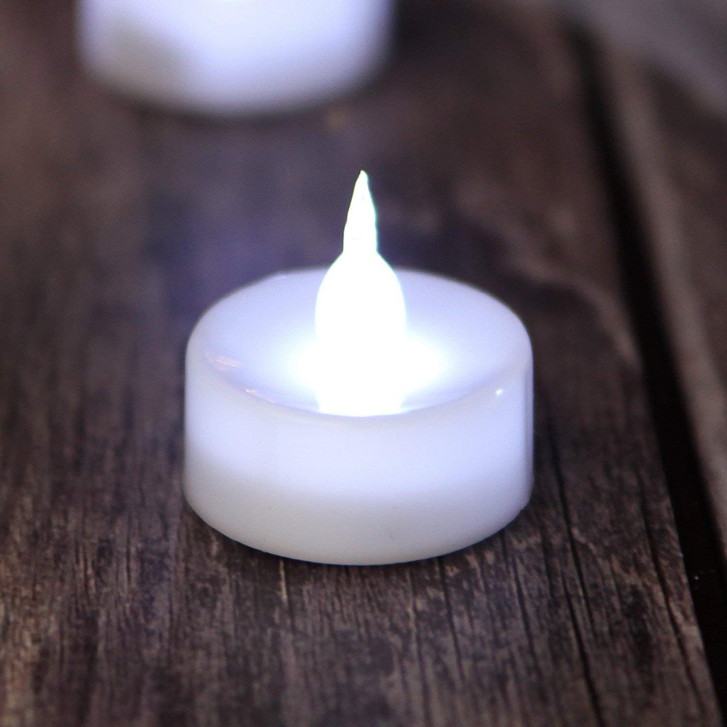 AGPTEK Tea Lights,24 Pack Flameless LED Candles Battery Operated Tealight Candles No Flicker Long Lasting Tealight for Wedding Holiday Party Home Decoration(Cool White)