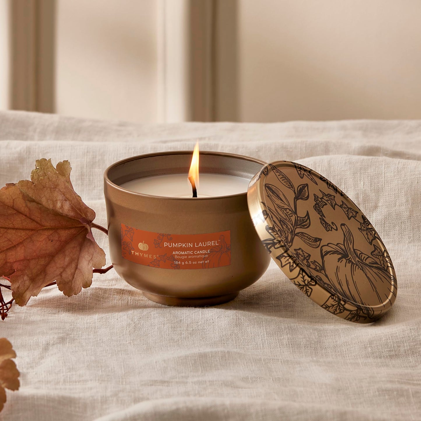 Thymes Scented Candles for Women & Men – Tin with Lid – Luxury Home Decor – Pumpkin Candles with Notes of Nutmeg, Cinnamon, Clove, & Orange Peel – Fall Decor (Pumpkin Laurel, 6.5 oz)