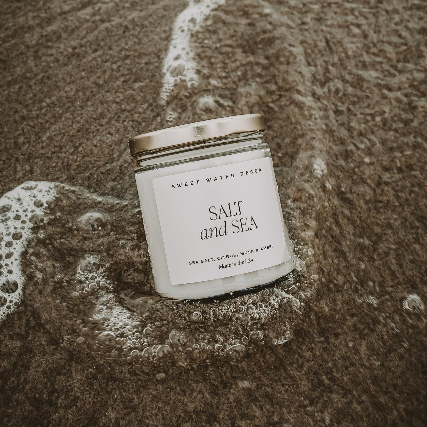 Sweet Water Decor Salt and Sea Candle - Sea Salt, Musk, and Amber Scents - Beach Candles and Decor for Home - 9oz. Clear Jar Soy Candle, Made in The USA