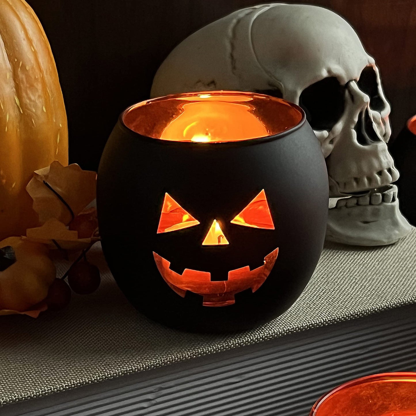 SHMILMH Halloween Table Centerpiece Candle Holders Set of 12, Black and Gold Glass Votive Holder with 6 Grimace, Tealight Holders Bulk for Halloween Party D?or