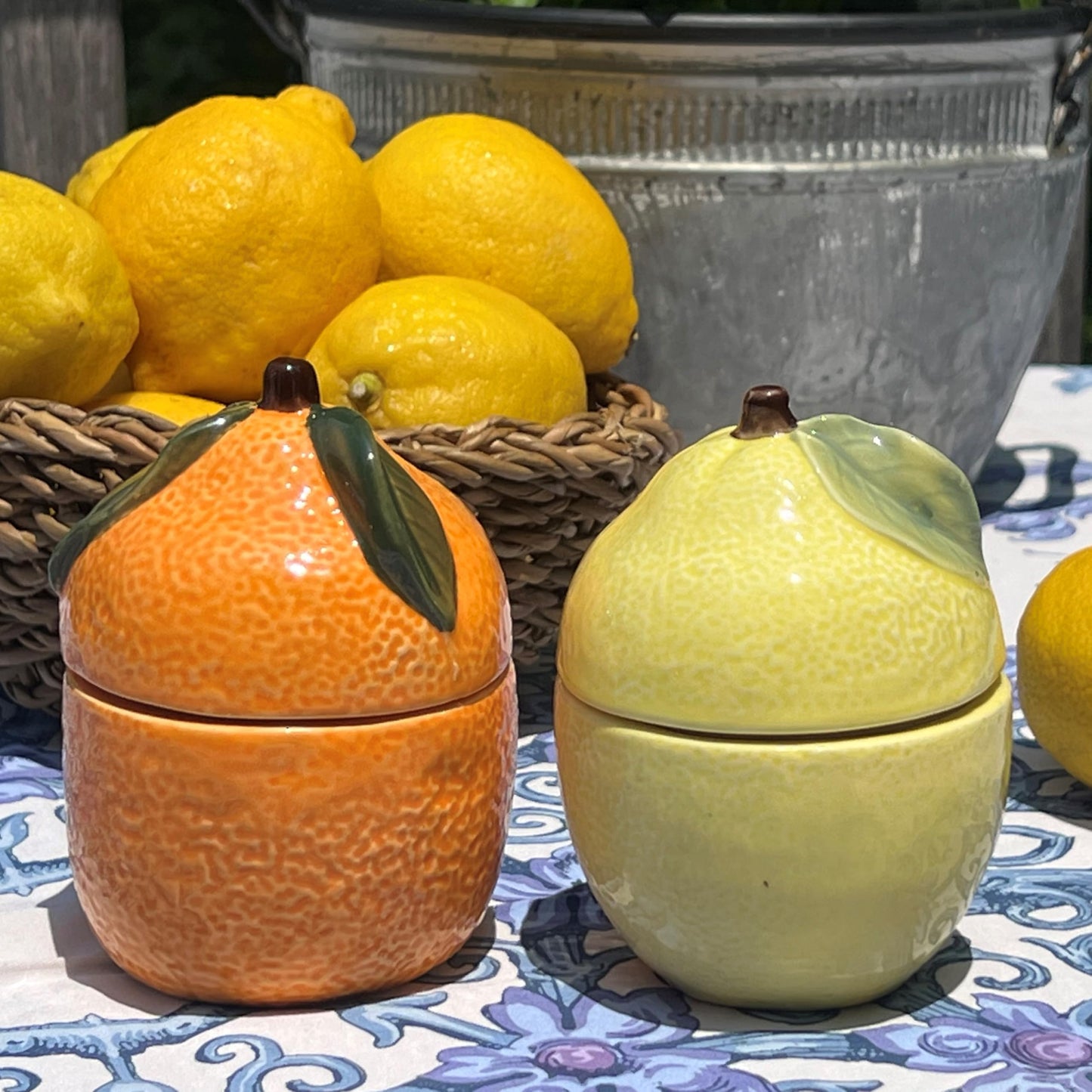 WHW Whole House Worlds Citrus Shaped Candles, Set of 2, 1 Lemon Yellow and 1 Bright Orange Ceramic Jars with Lids, Long Burn Time, 13 hours burn time, 4.75 Inches Each