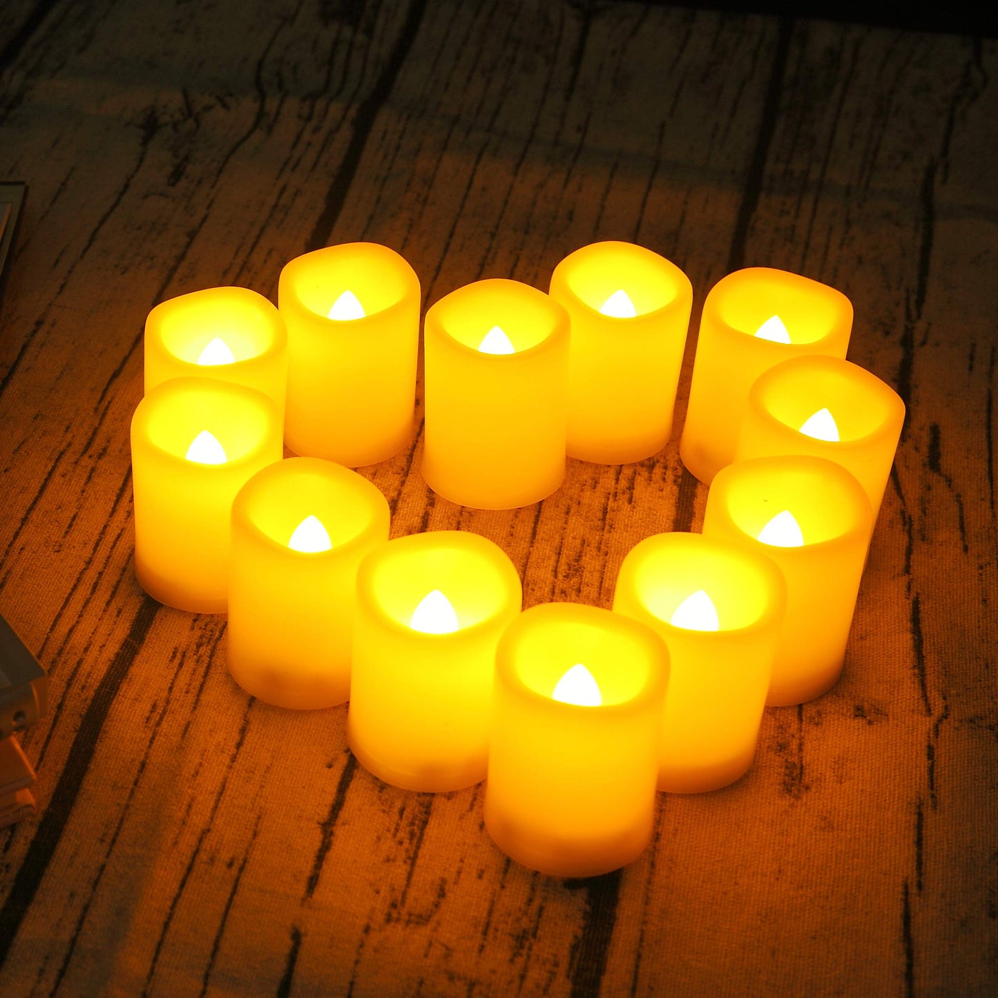 12 PCS Battery Operated Flameless Votive Candles LED Flickering Electric Fake Tea Lights Set Bulk for Christmas Wedding Party Decorations Home Décor, White Base Amber Glow, Batteries Incl.