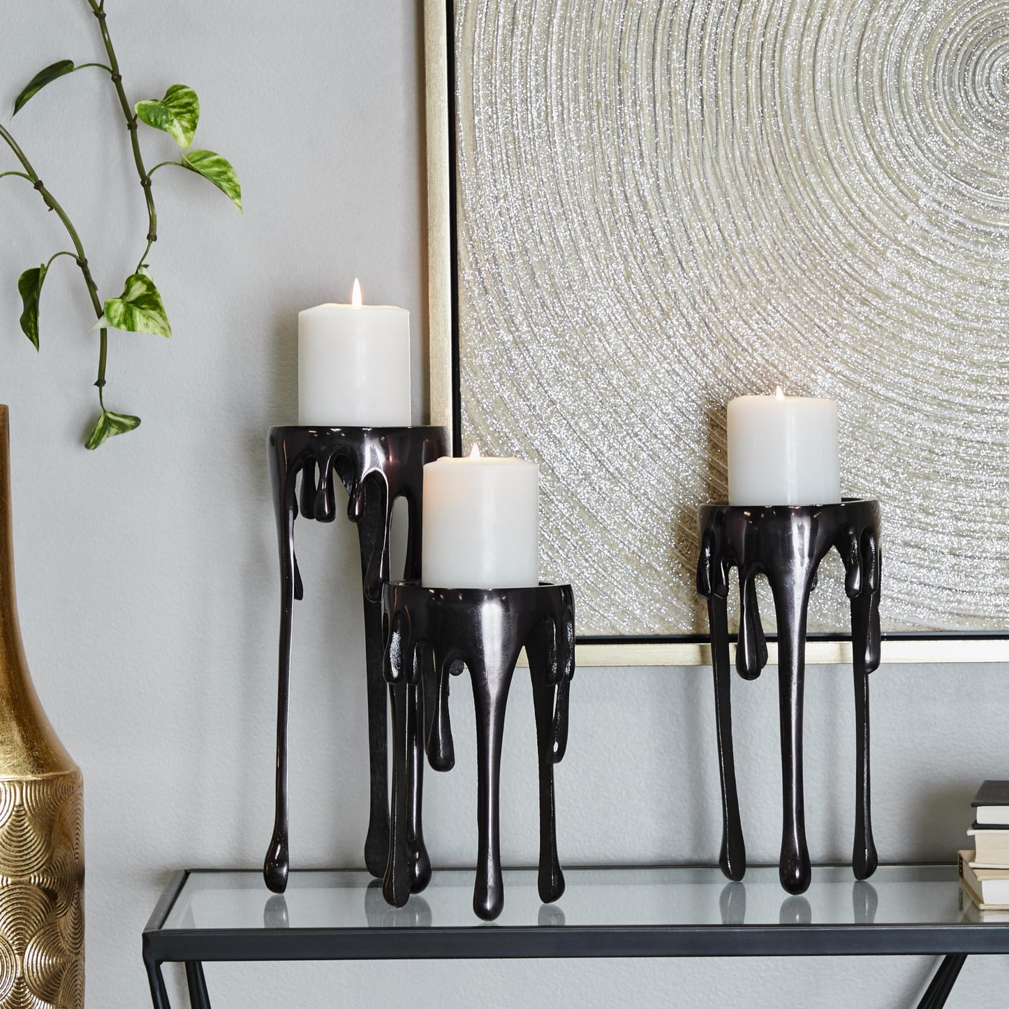 CosmoLiving by Cosmopolitan Aluminum Metal Decorative Candle Holder Pillar Candle Stand with Dripping Melting Designed Legs, Set of 3 Candlestick Holder 12", 10", 8"H, Black